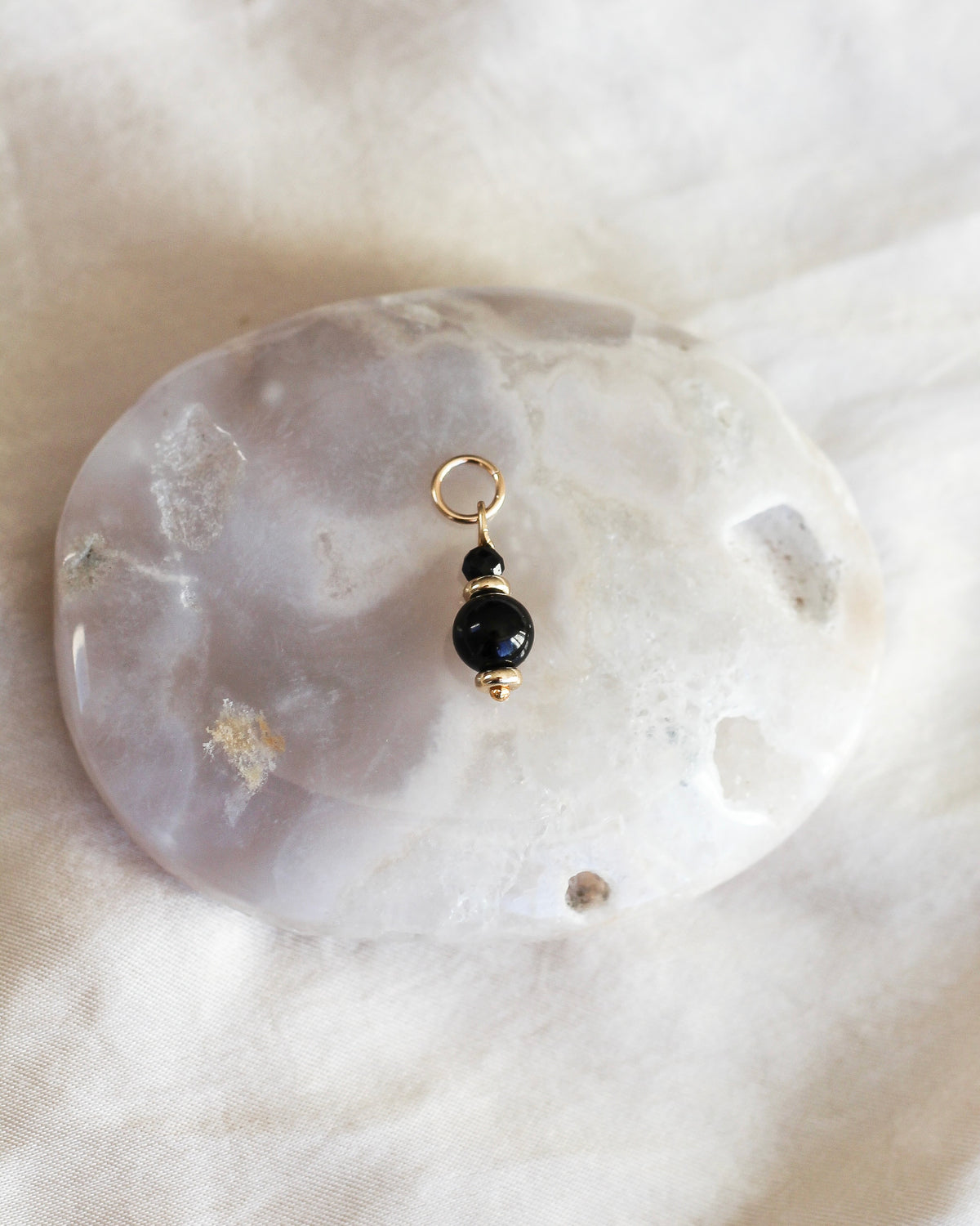 Handmade Black Tourmaline gemstone charm featuring natural black gemstone beads.