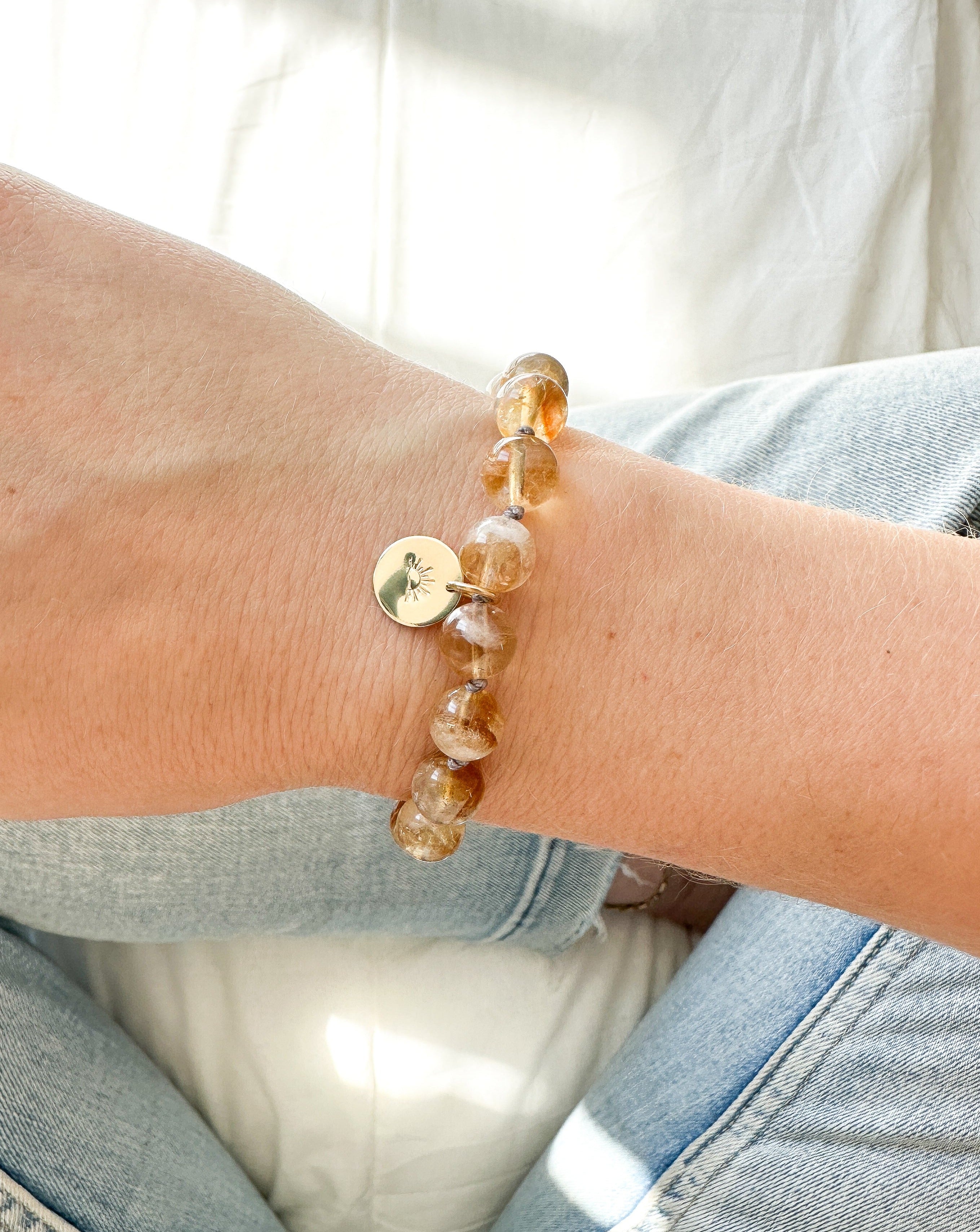 citrine mala bracelet with gold sun charm