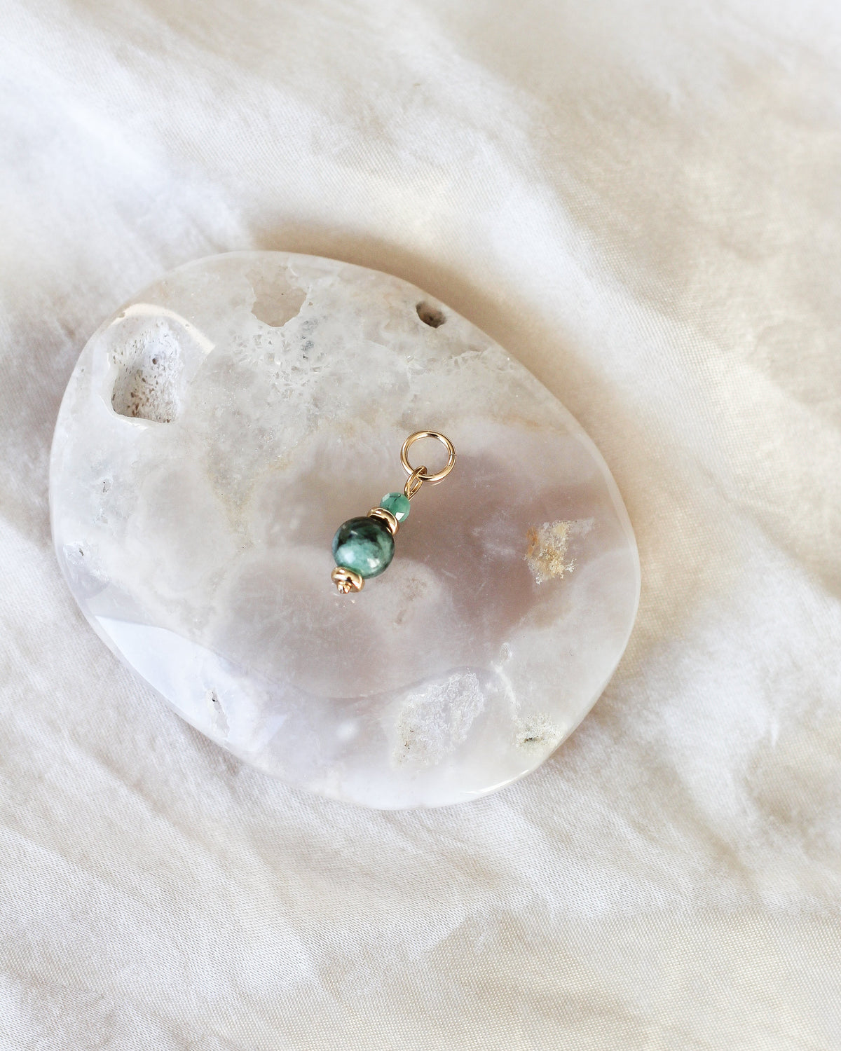Handmade Emerald gemstone charm featuring natural green Emerald beads.