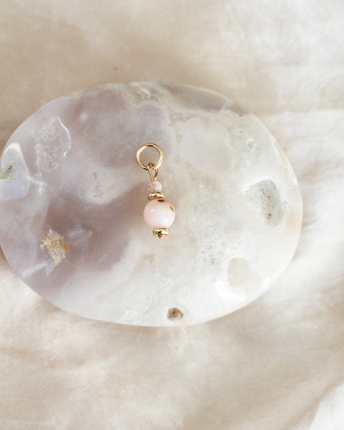 Handmade Pink Opal gemstone charm featuring delicate pink gemstone beads.