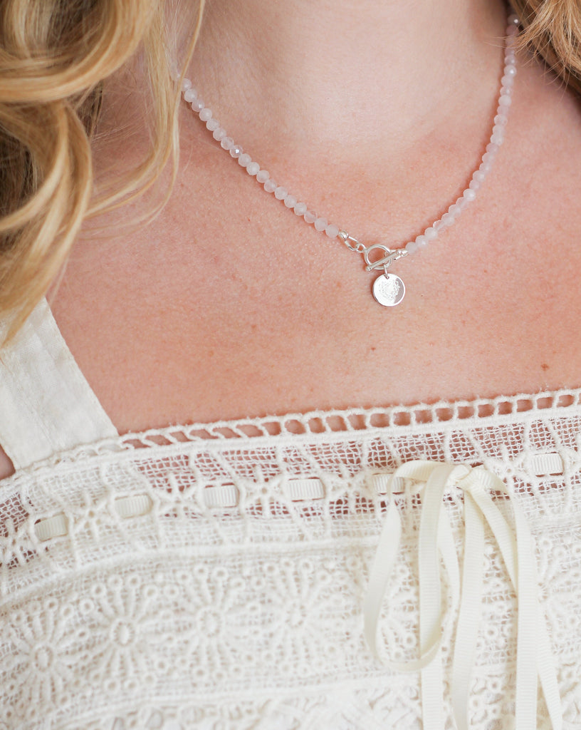 rose quartz intention necklace with silver heart charm