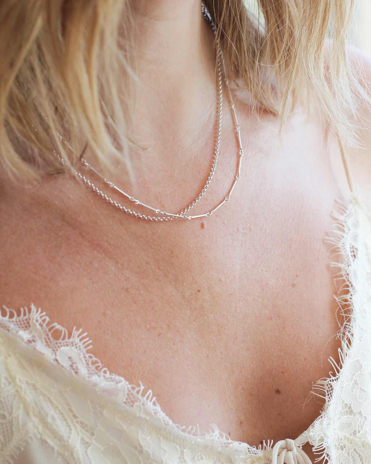 sterling silver rolo chain layered with other sterling silver necklace