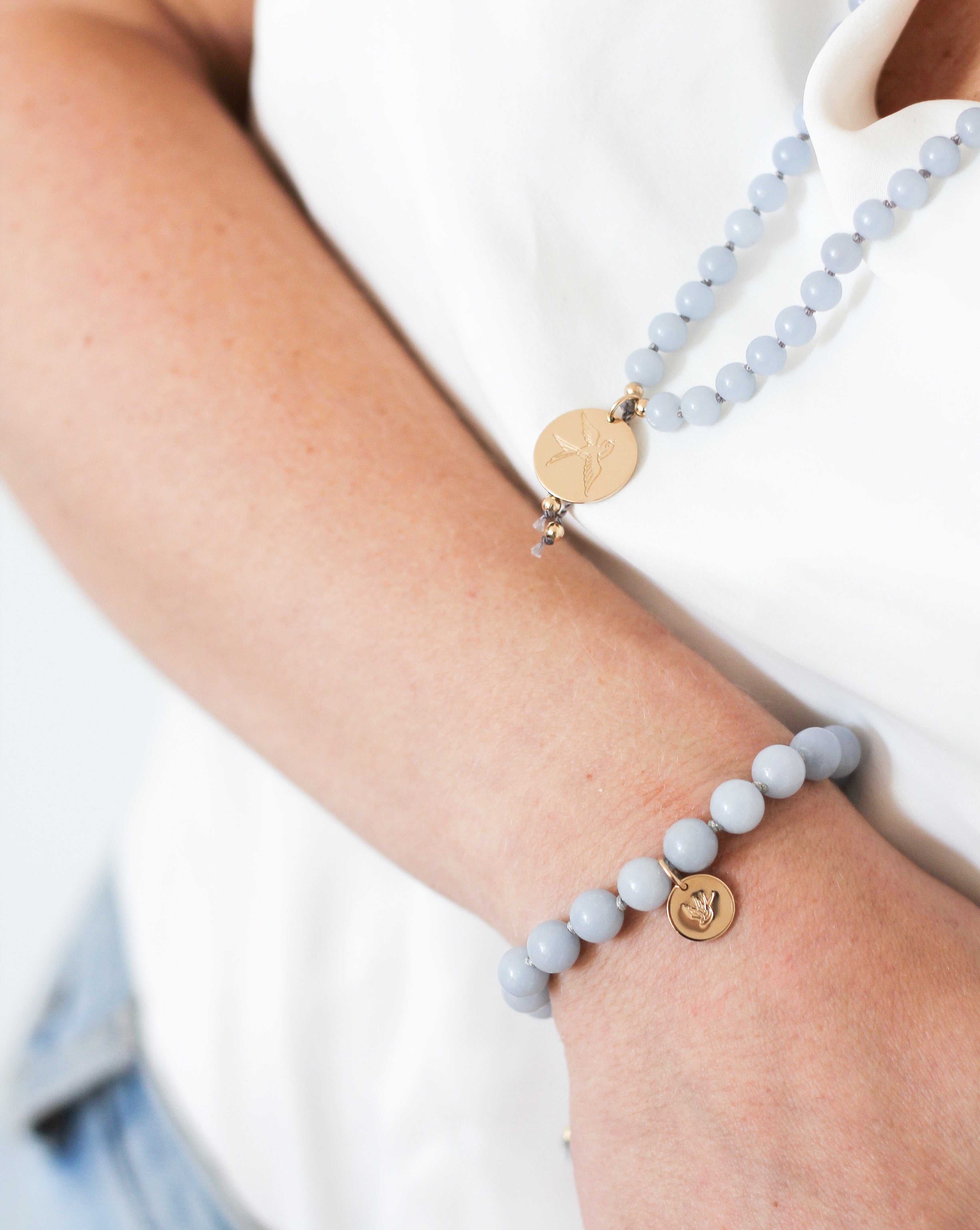 angelite mala beads bracelet on wrist