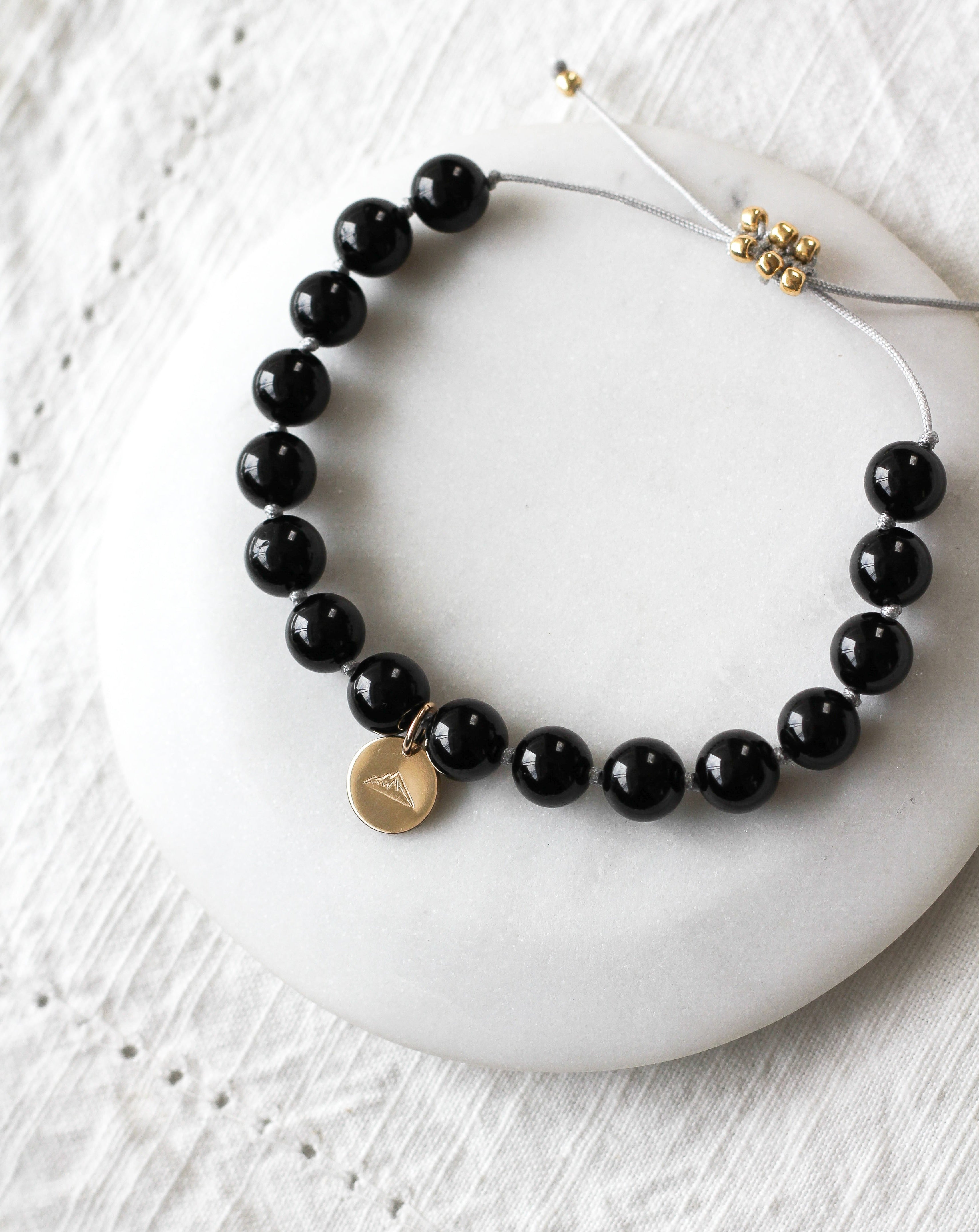black tourmaline mala bracelet with mountain charm