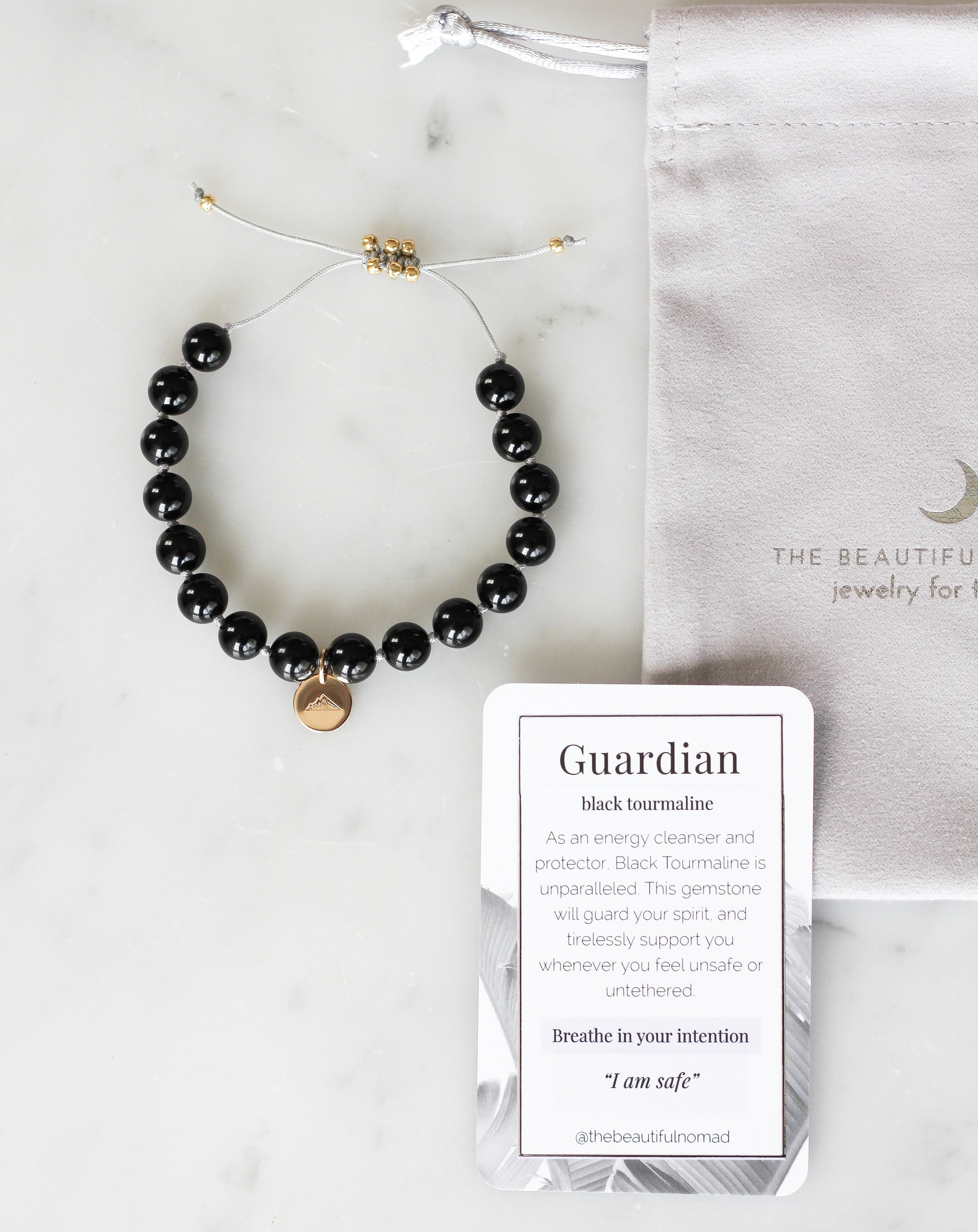 black tourmaline mala bracelet with mountain charm