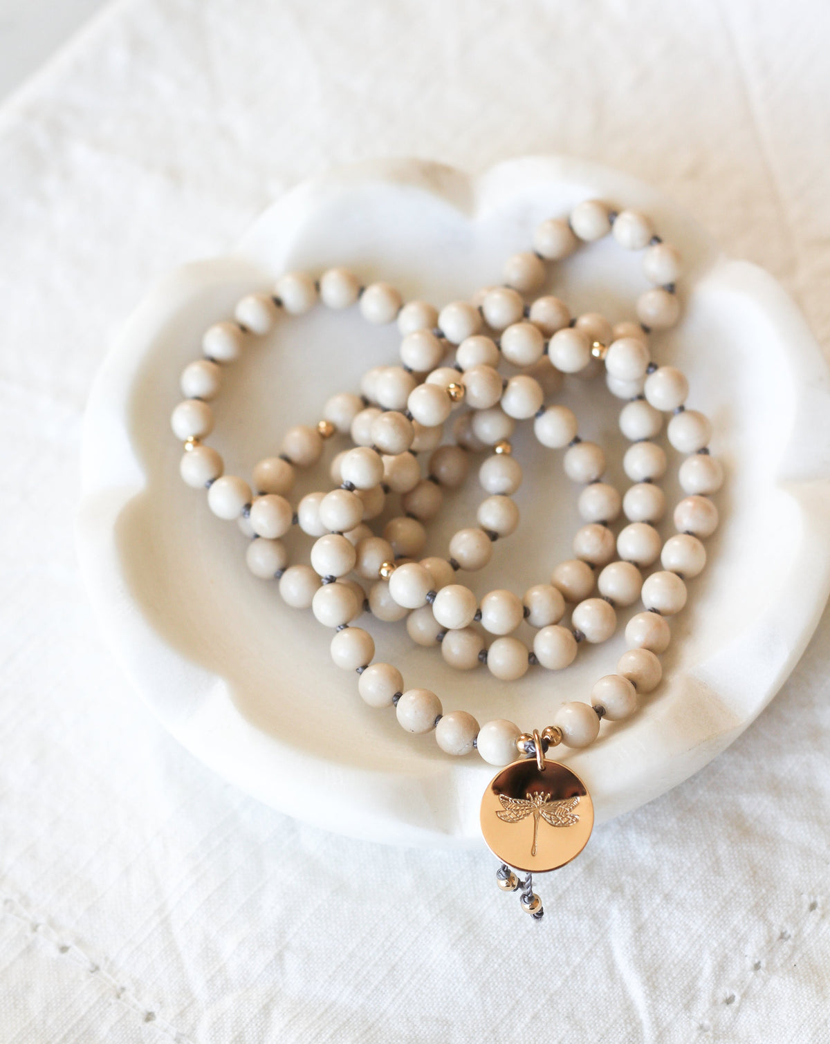 riverstone mala pendant necklace with dragonfly medallion