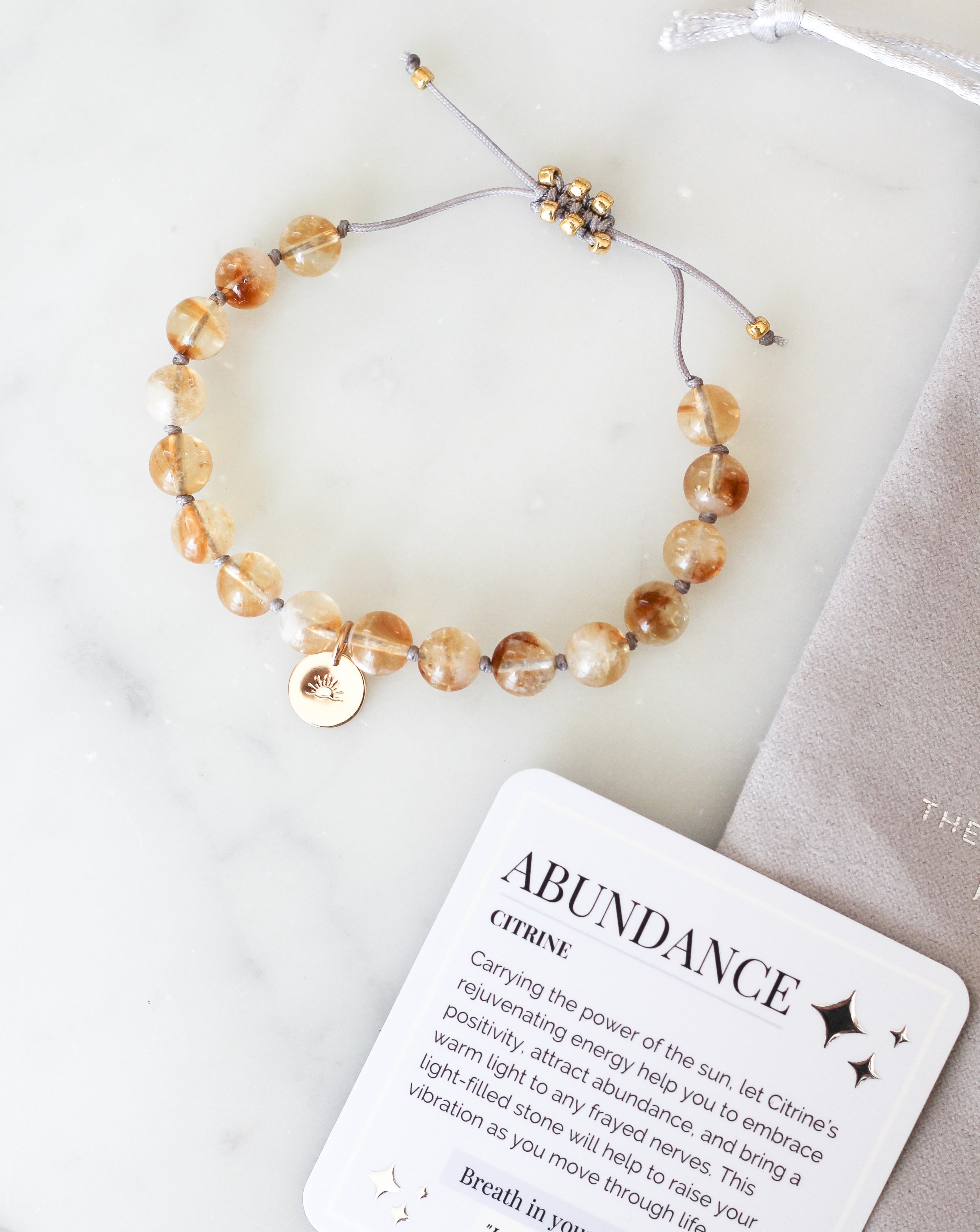 citrine mala bracelet with gold sun charm