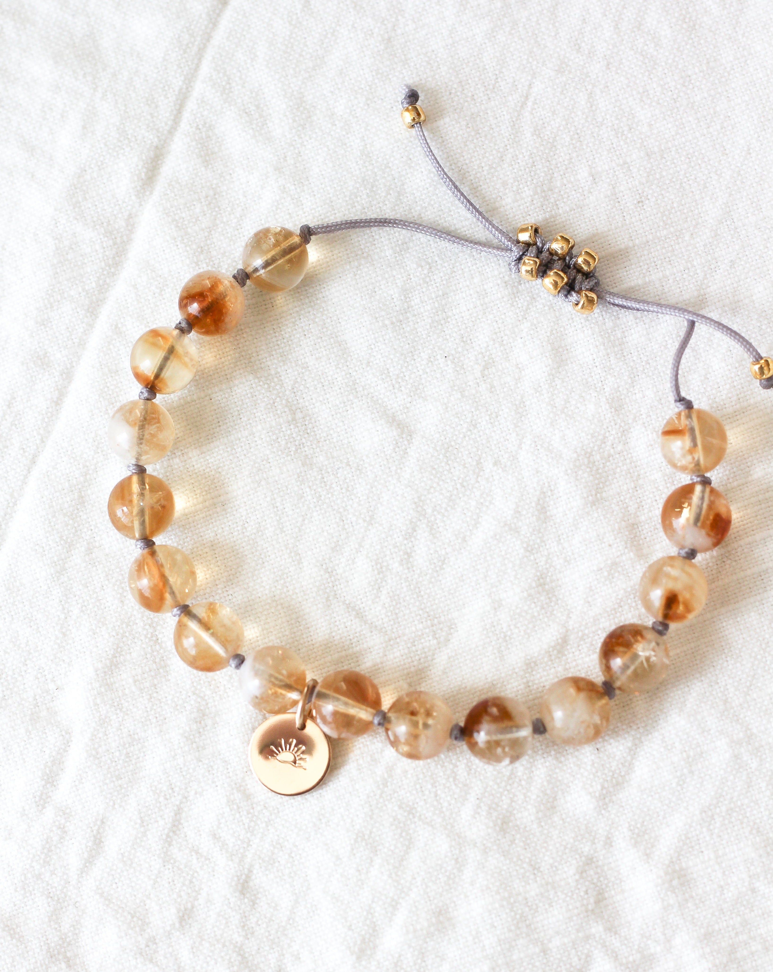 citrine mala bracelet with gold sun charm