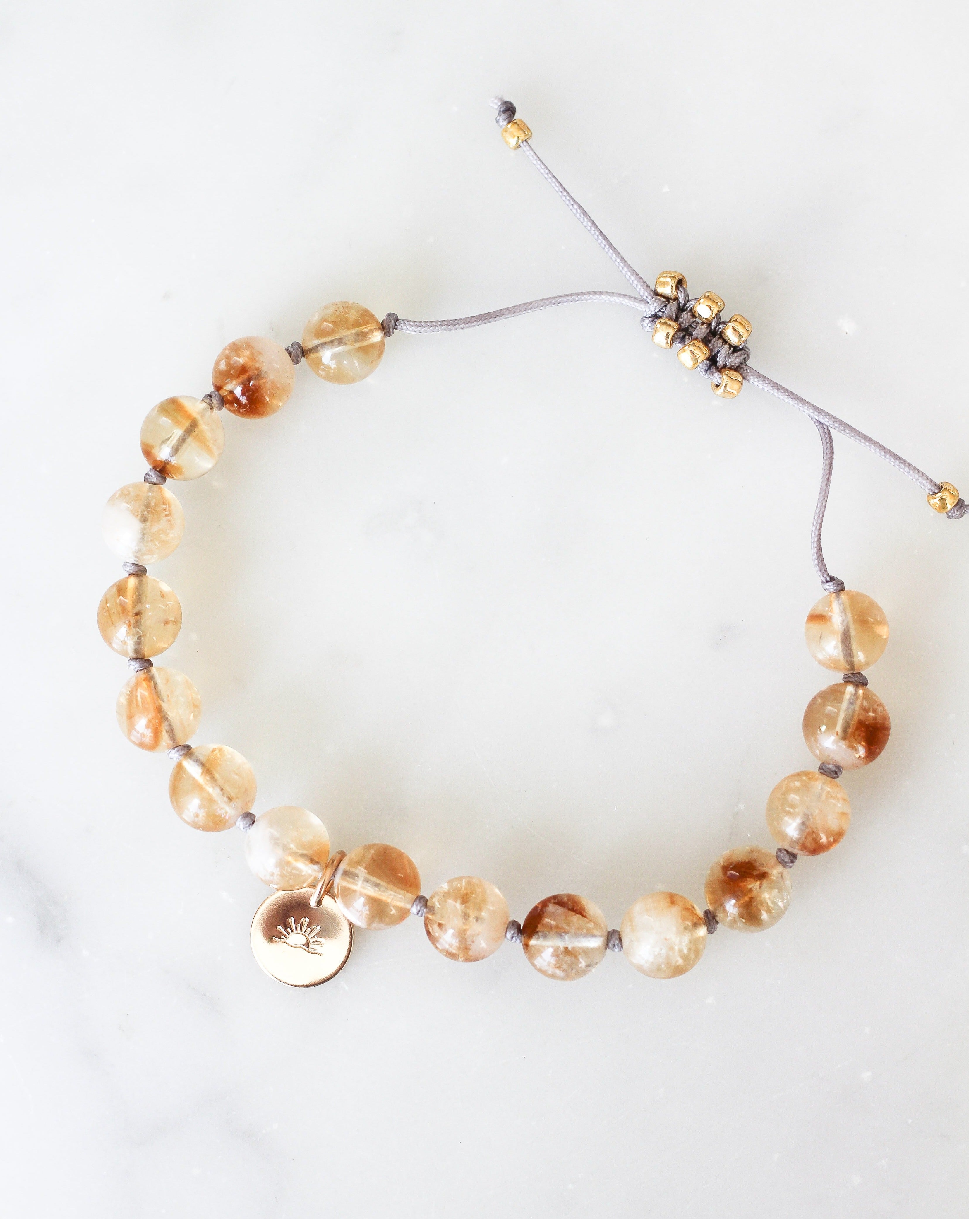 citrine mala bracelet with gold sun charm