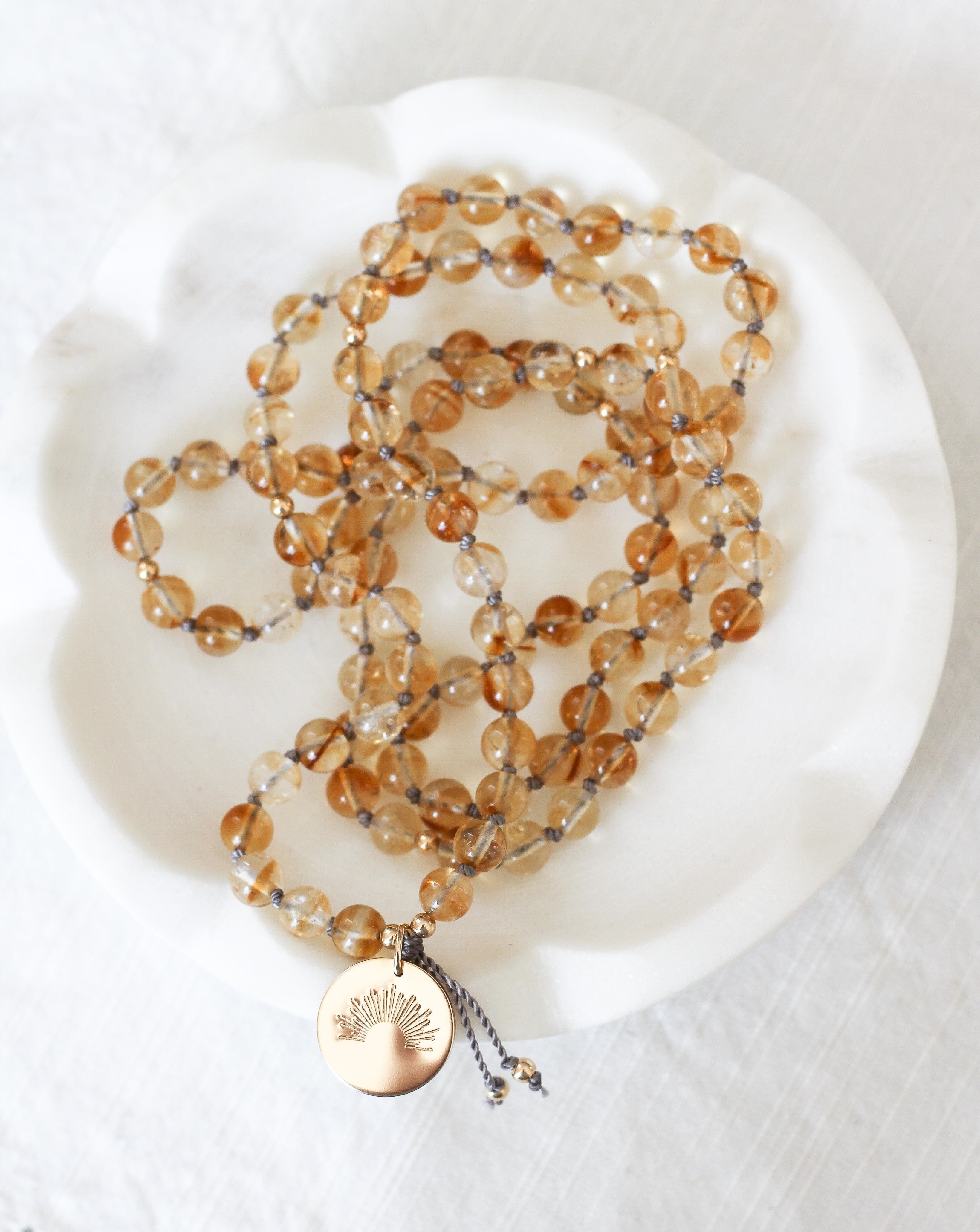 citrine mala pendant necklace with gold sun pendant