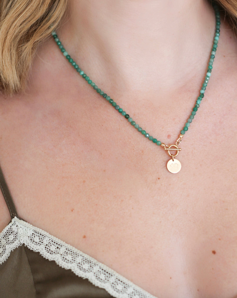 emerald intention necklace with clover charm
