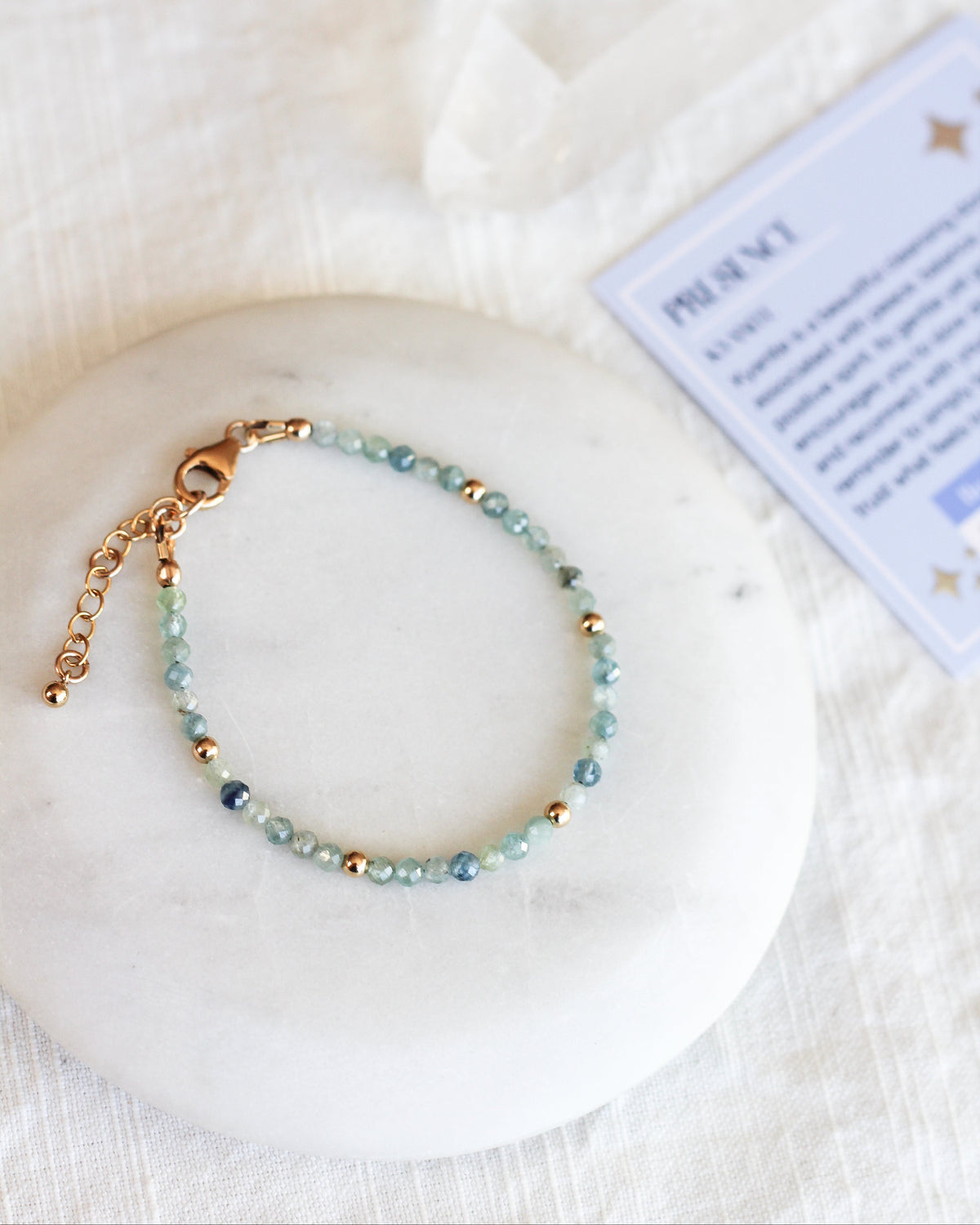 Handmade Kyanite beaded bracelet featuring rare, bicolour 3mm faceted gemstones.