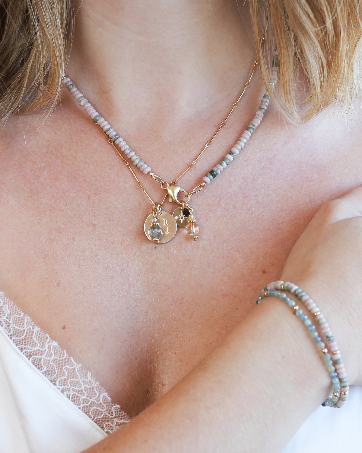Nevada Lapis gemstone necklace personalized with meaningful charms.