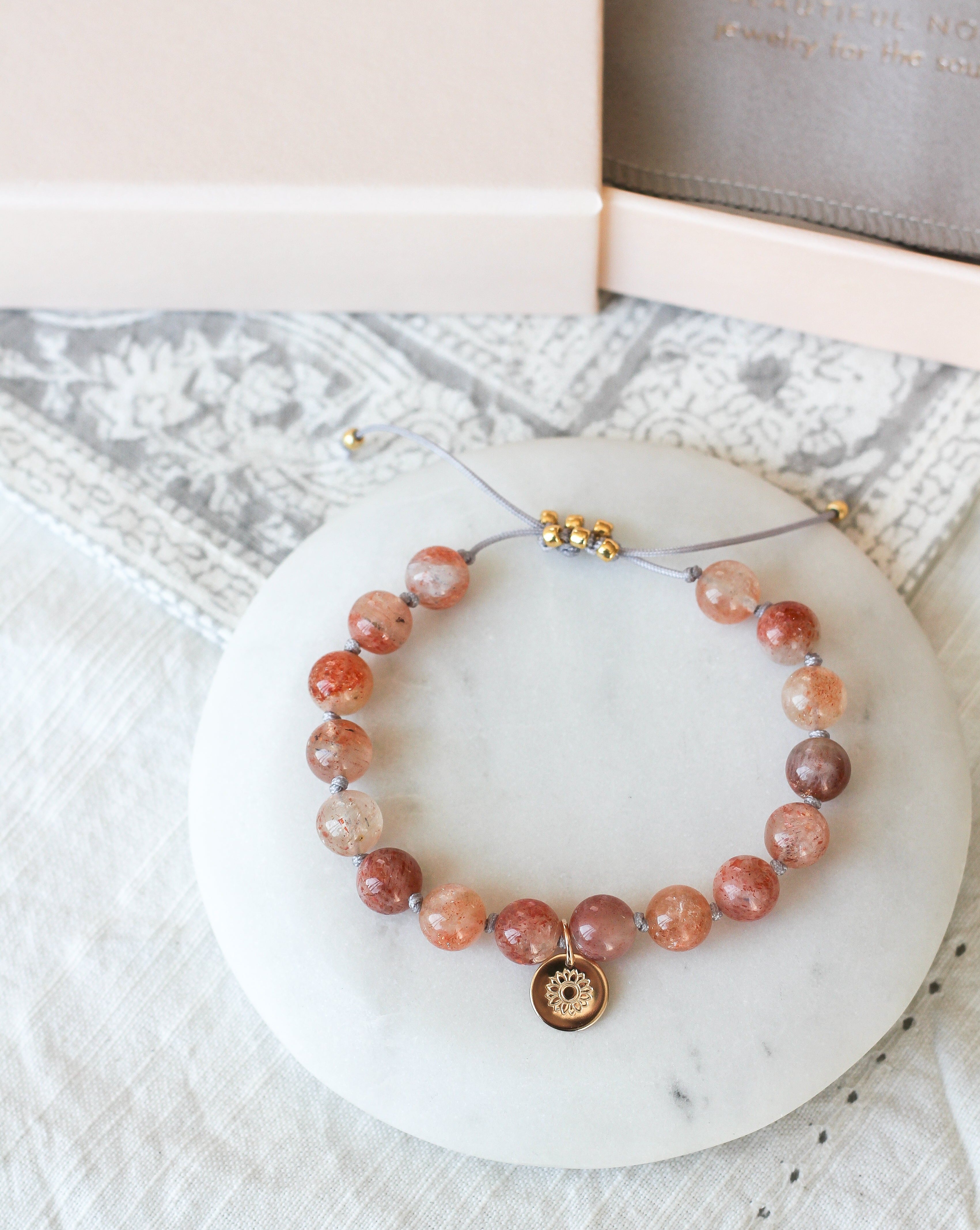 sunstone mala bracelet with sunflower charm