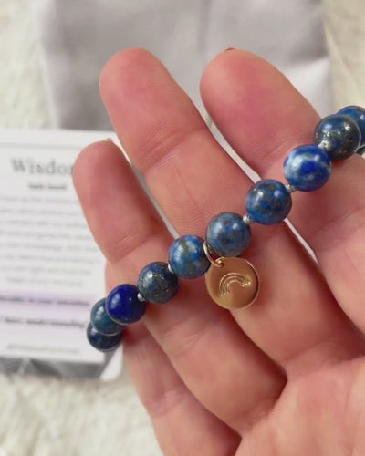 lapis lazuli mala bracelet with rainbow charm