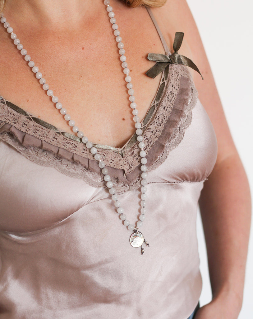 Quartz Mala Pendant Necklace on model